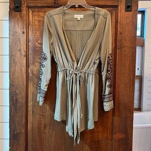 Olive green jacket with embroidered sleeves